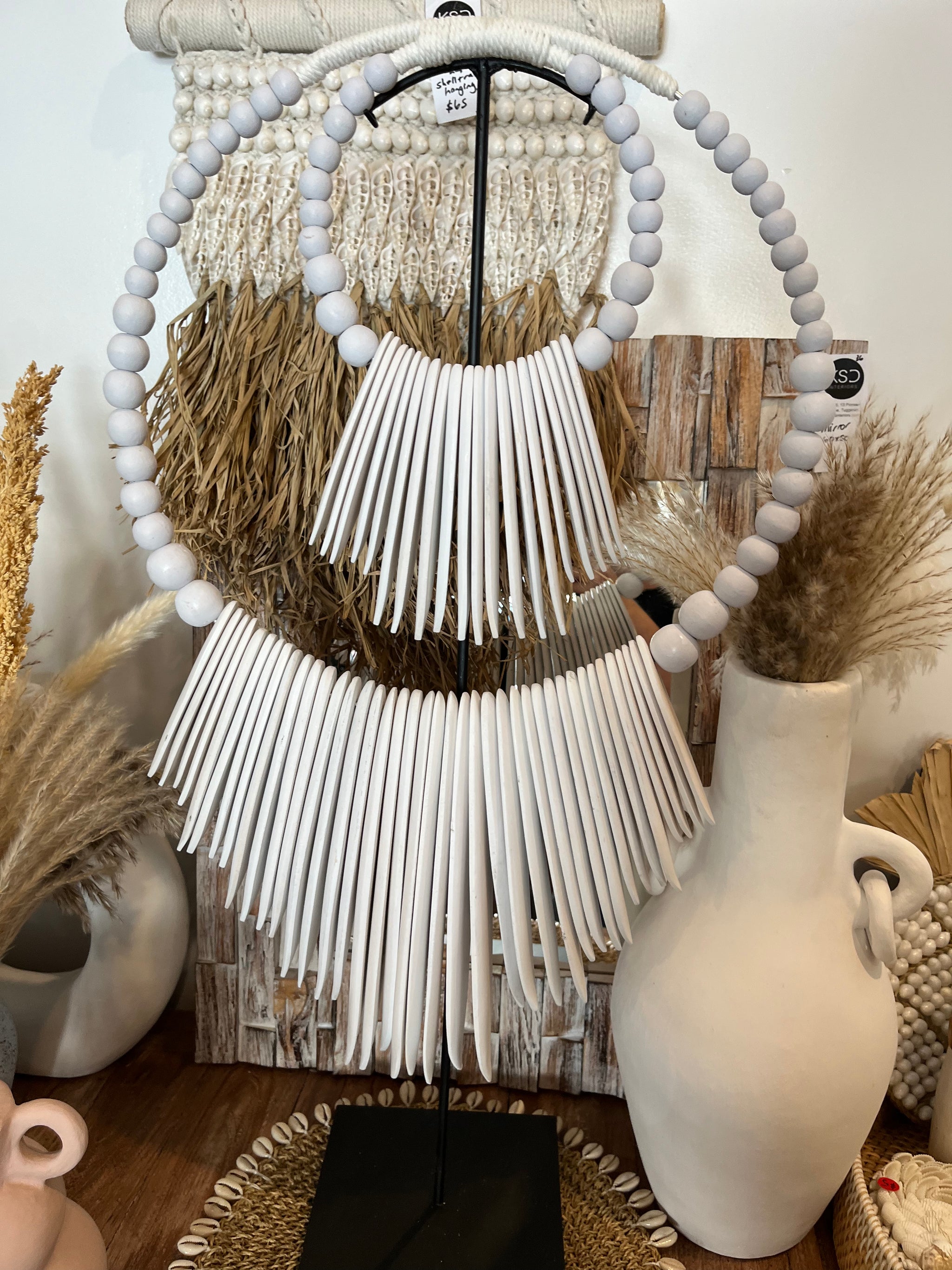 White timber decoration on stand - Bali Beach Beyond