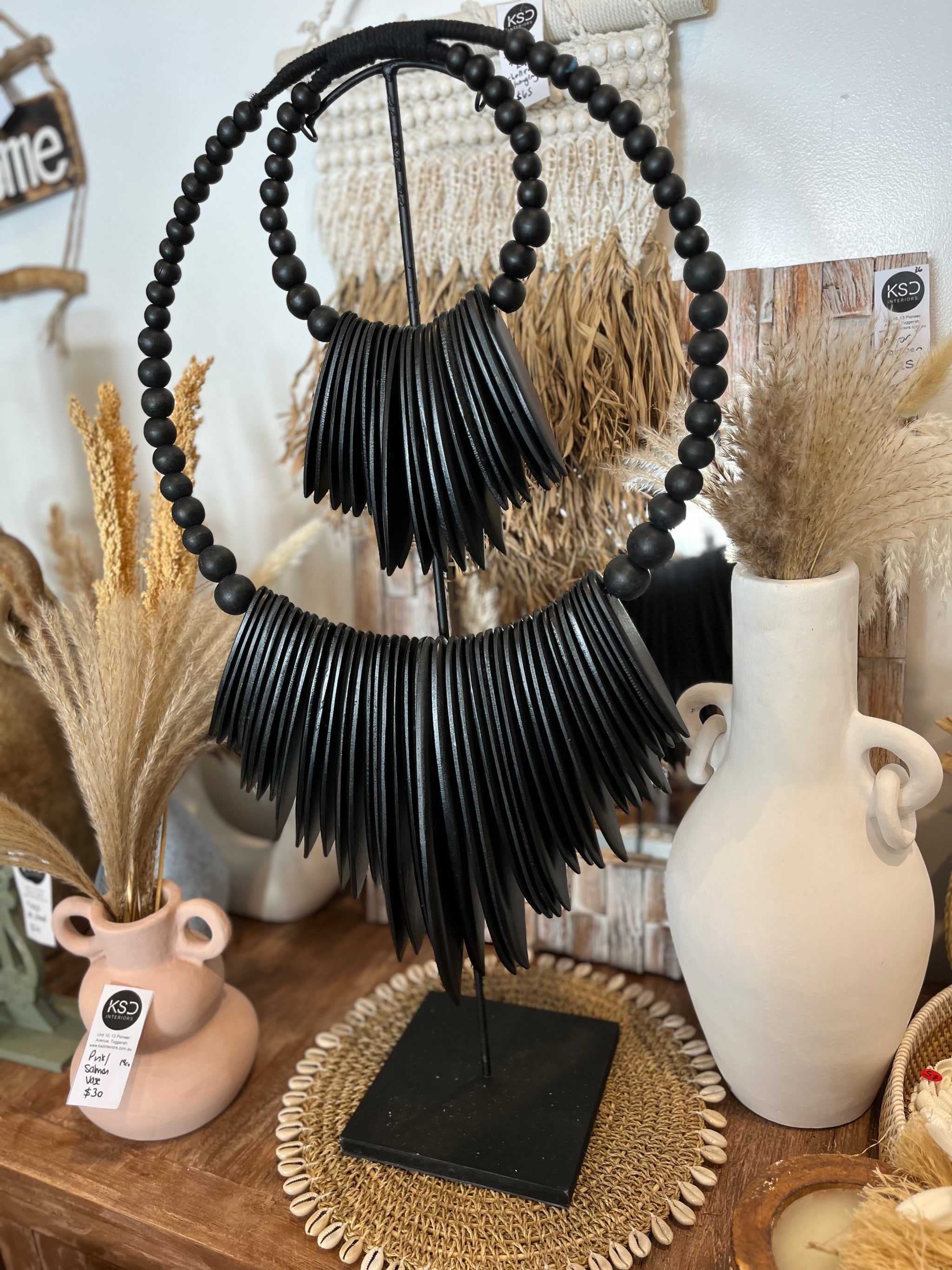 Black timber decoration on stand - Bali Beach Beyond
