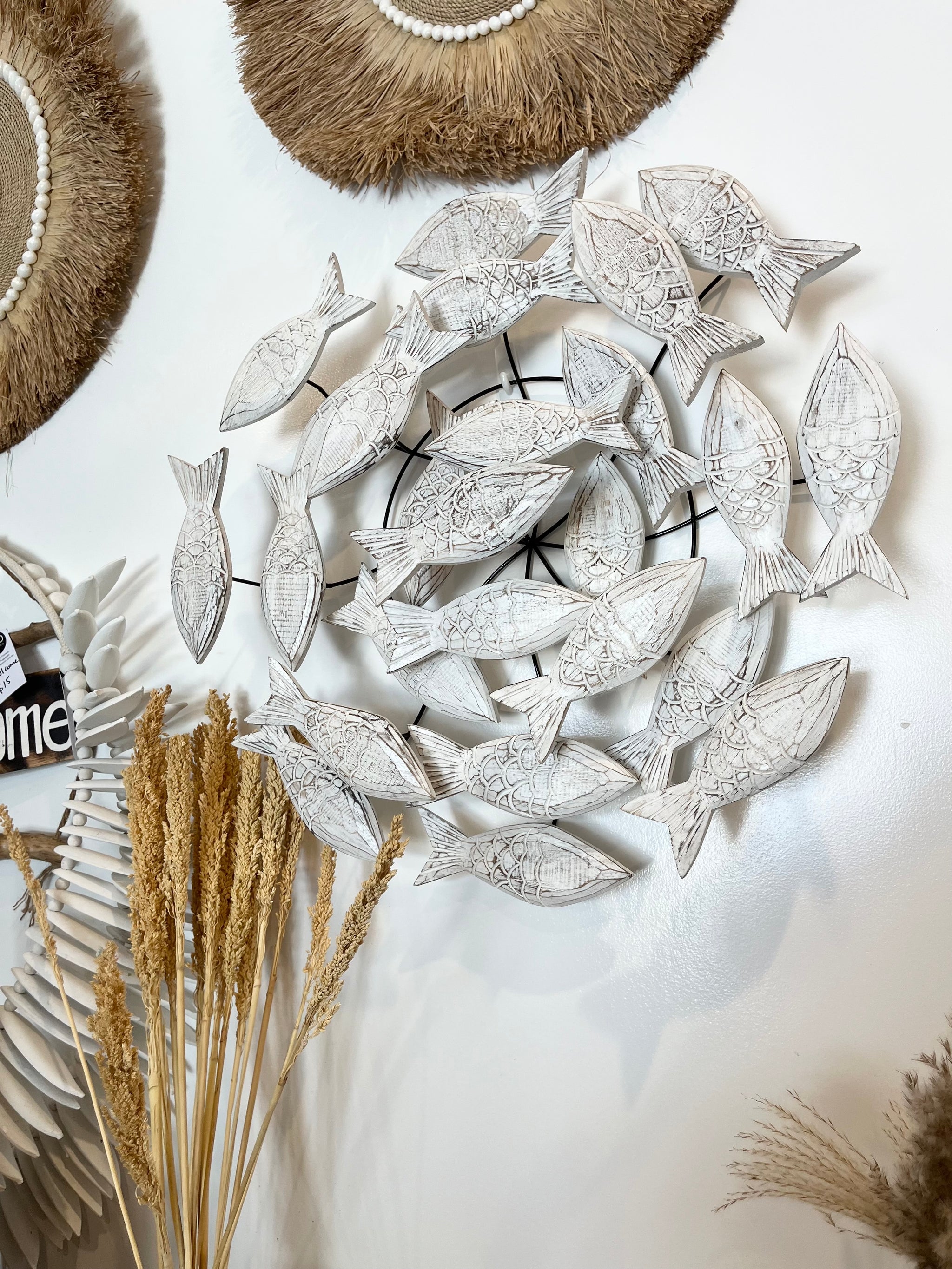 Round metal hanging with timber fish - Bali Beach Beyond