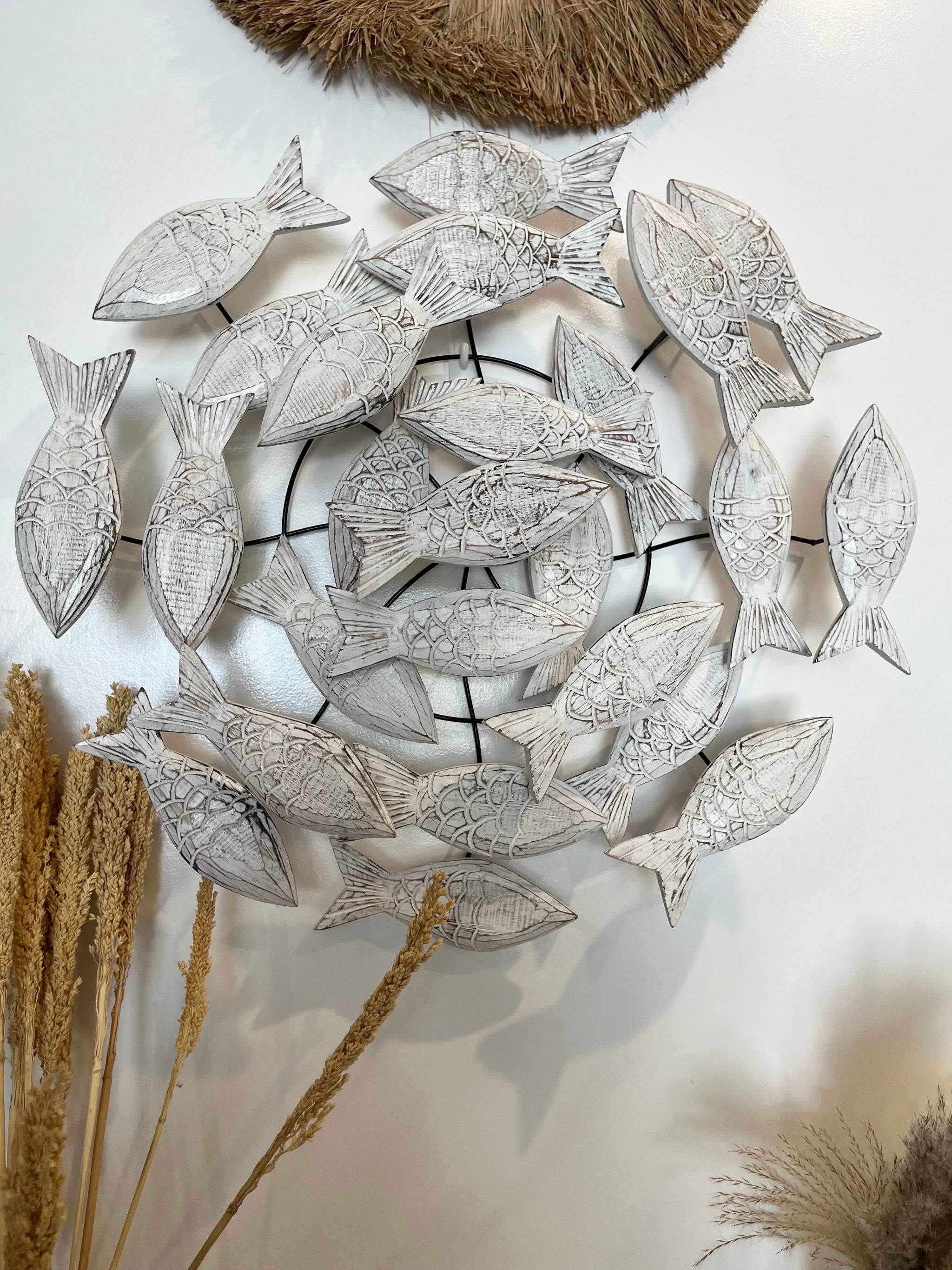 Round metal hanging with timber fish - Bali Beach Beyond