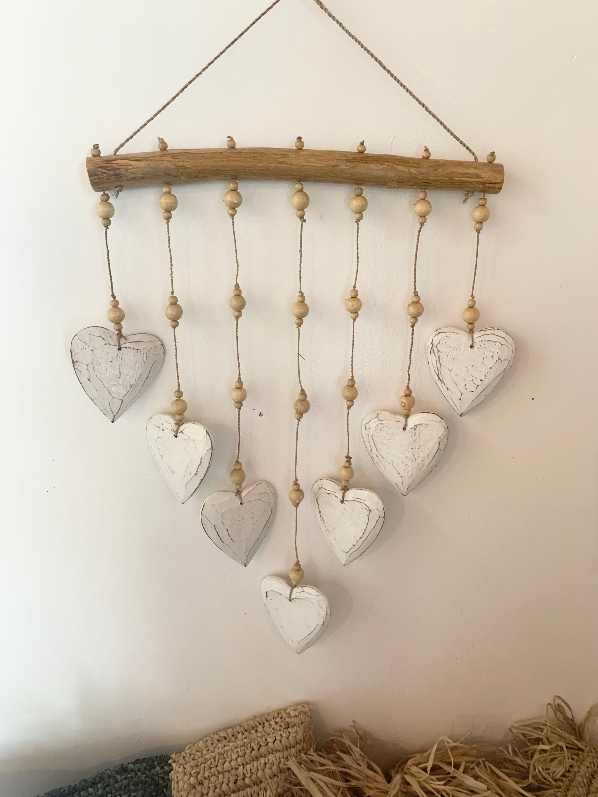 Timber white hearts hanging. - Bali Beach Beyond