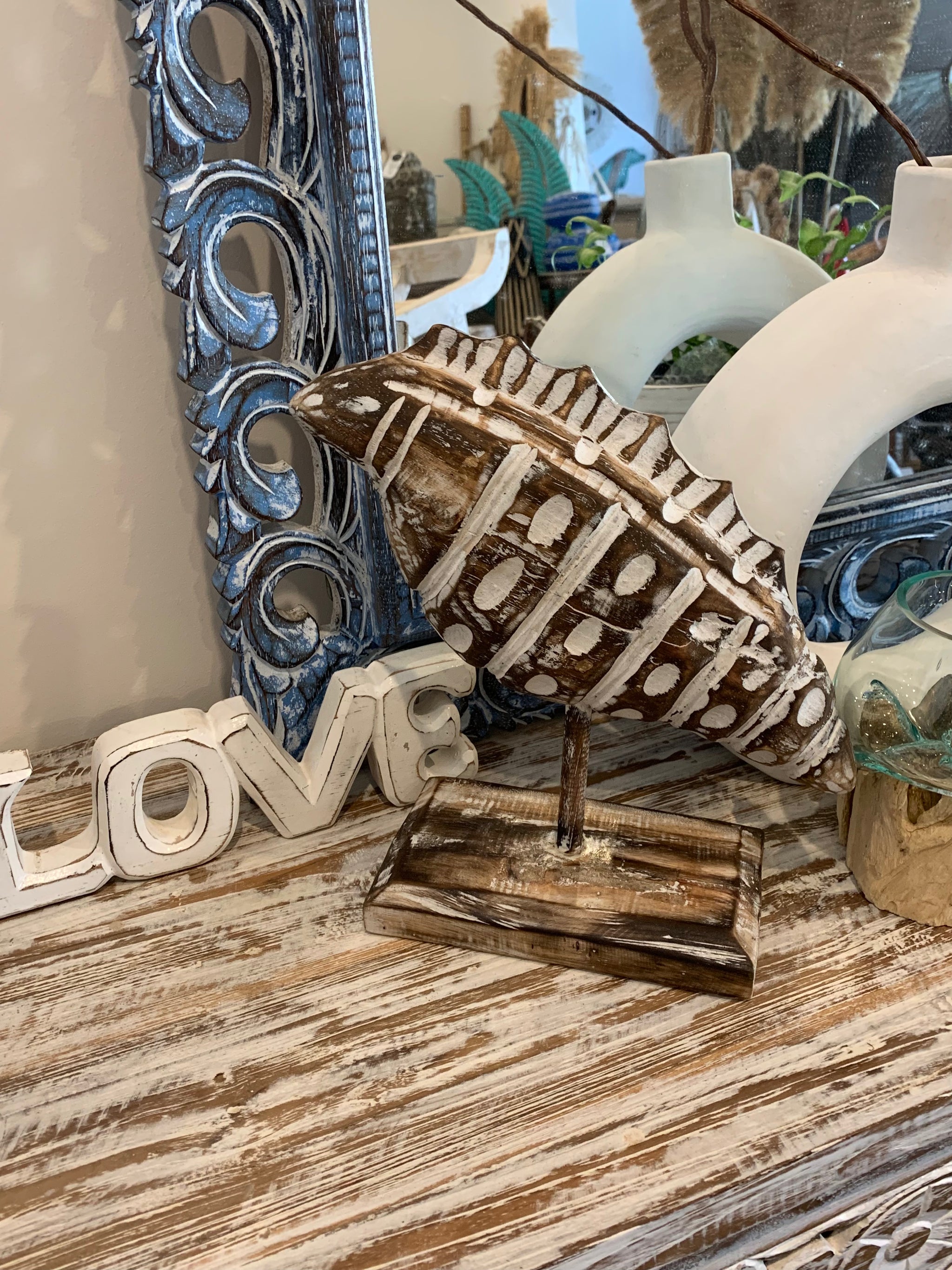 Carved timber shell on stand. Brown. Medium - Bali Beach Beyond