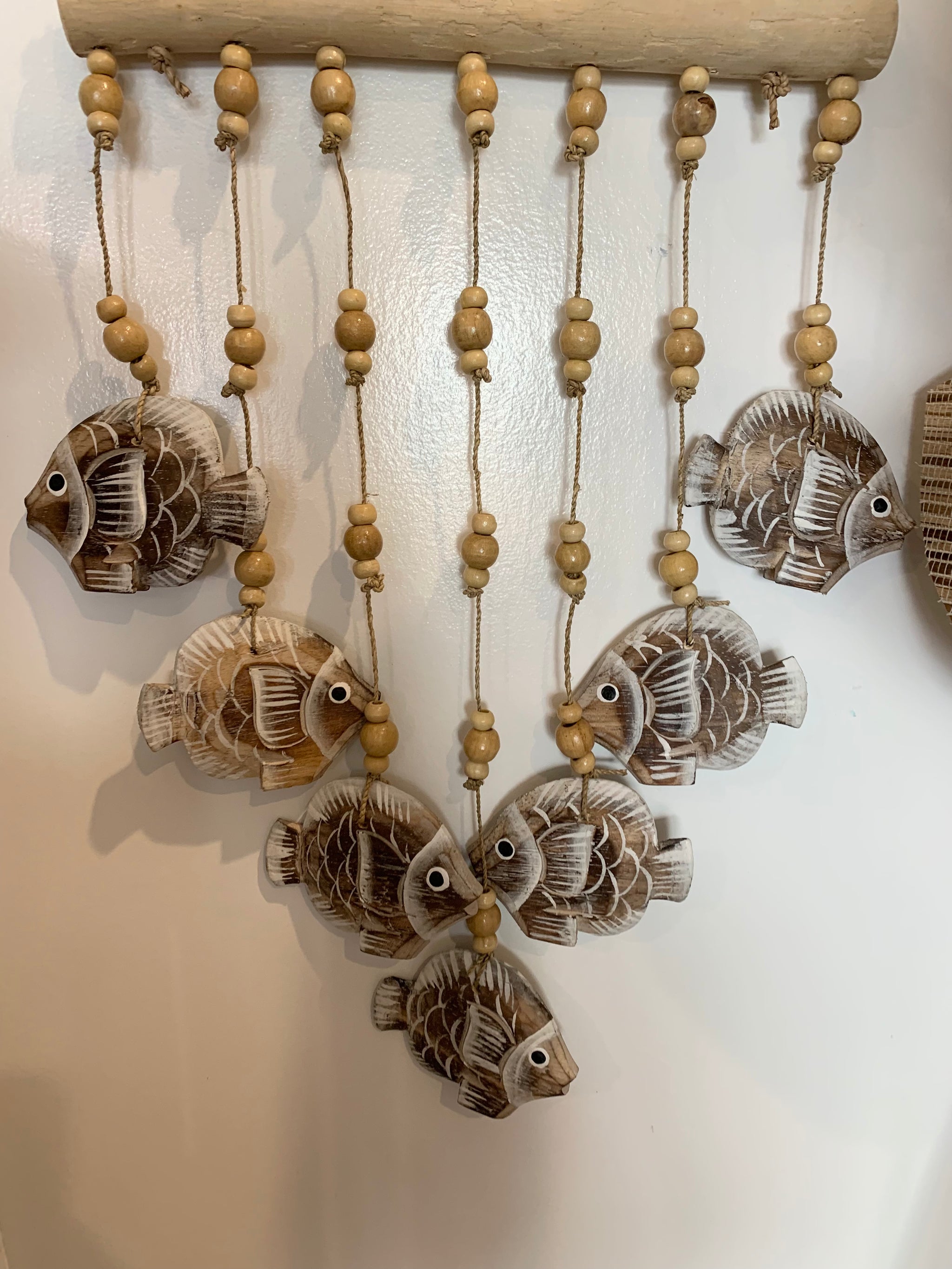 Brown carved timber fish wall hanging. - Bali Beach Beyond