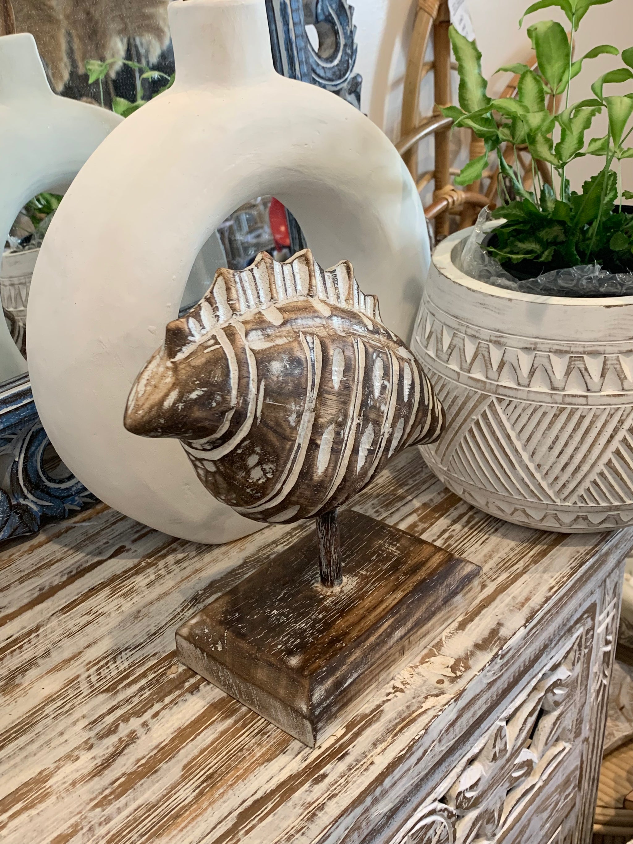 Carved timber shell on stand. Brown. Small - Bali Beach Beyond