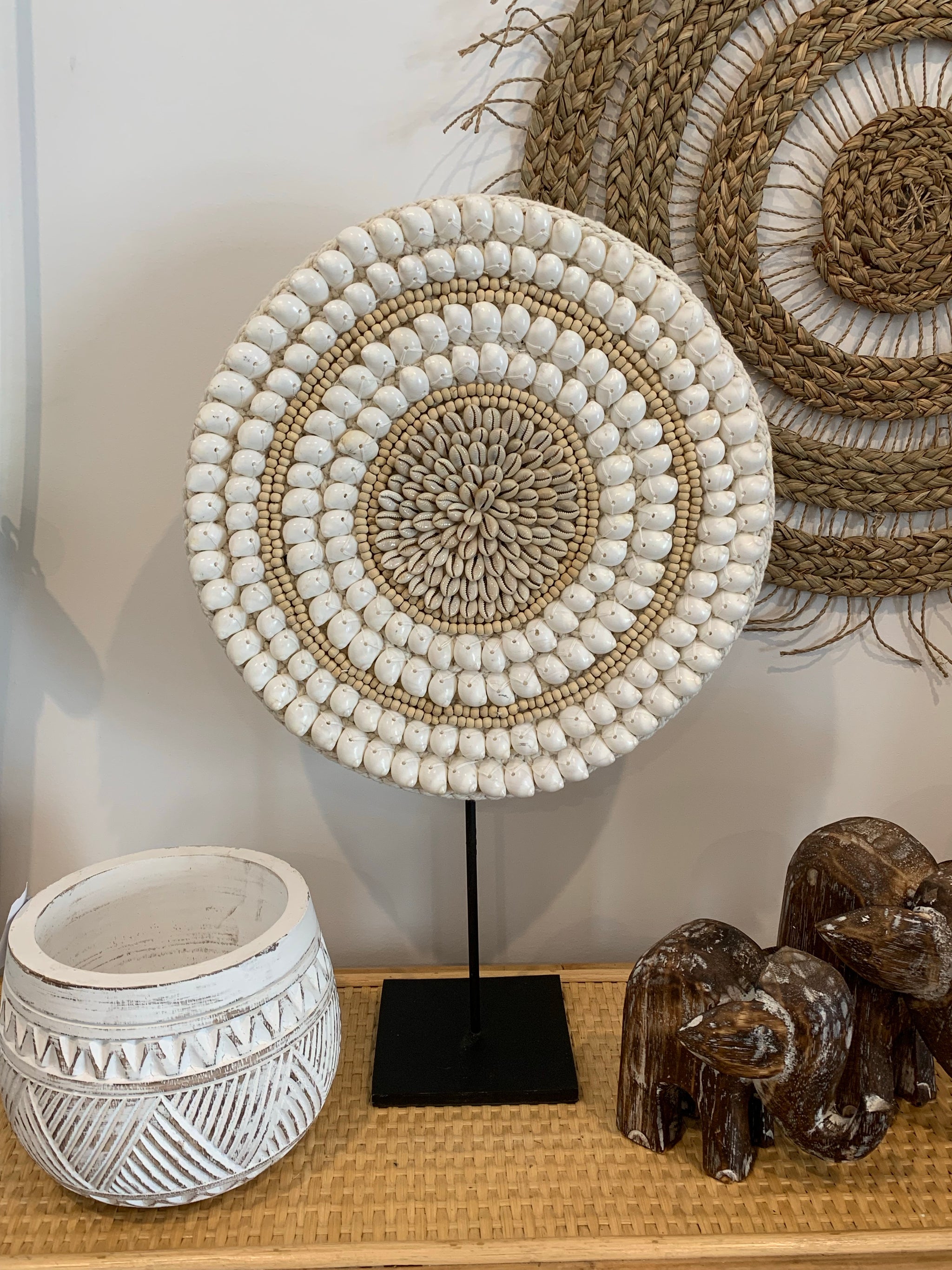 Shell disc on stand. - Bali Beach Beyond