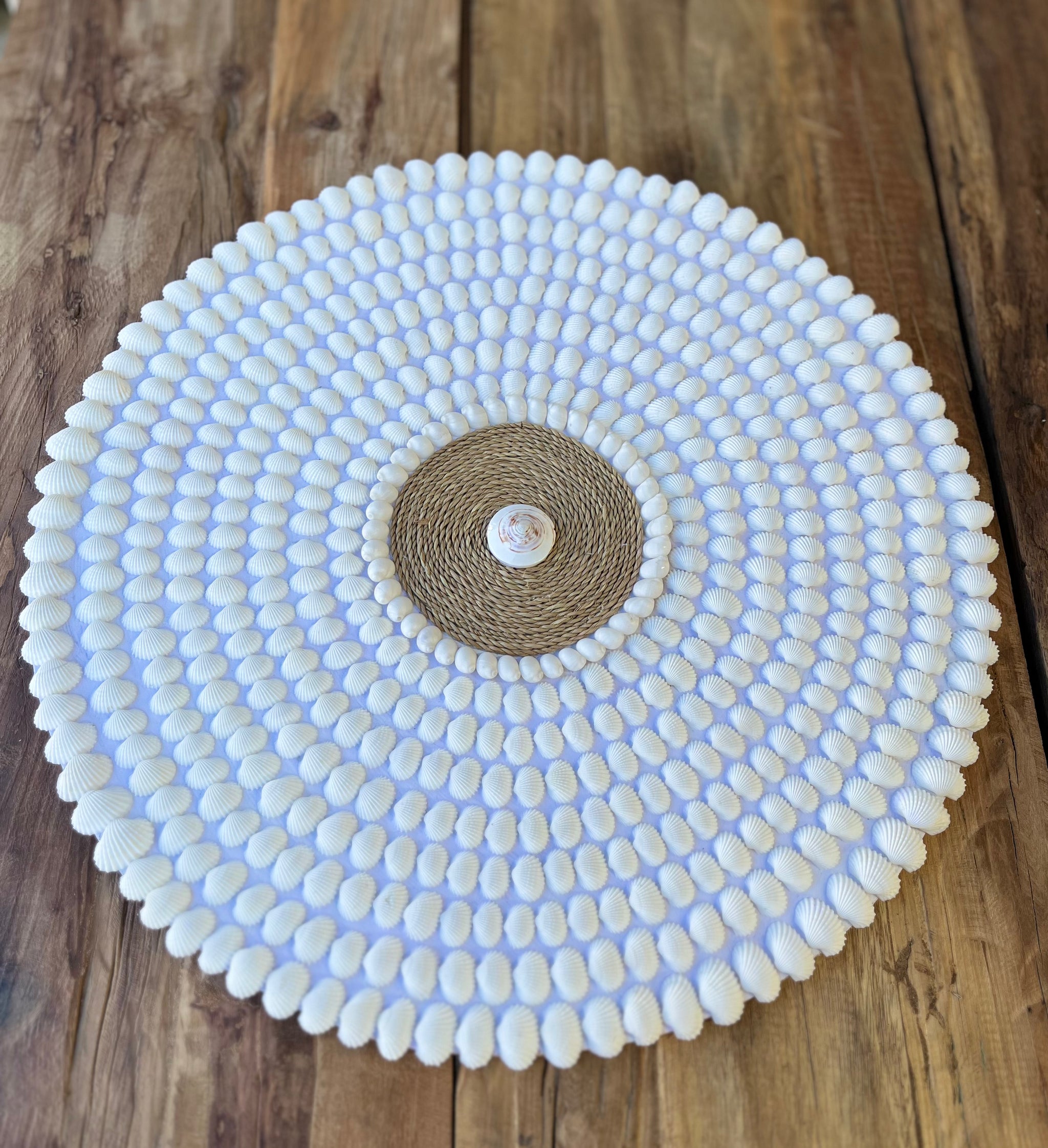 Round detailed shell wall hanging. - Bali Beach Beyond