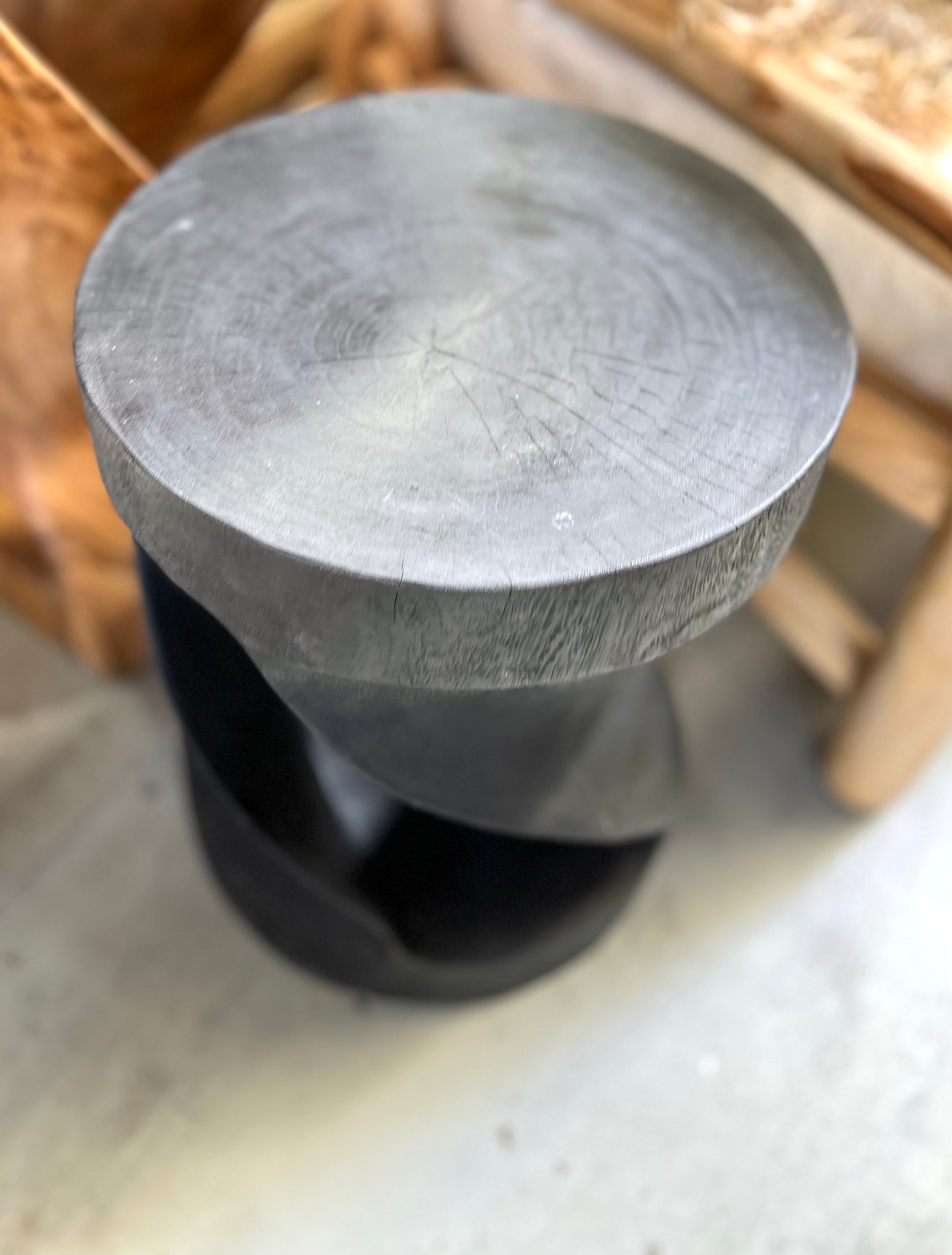 Black twisted timber stool / side table