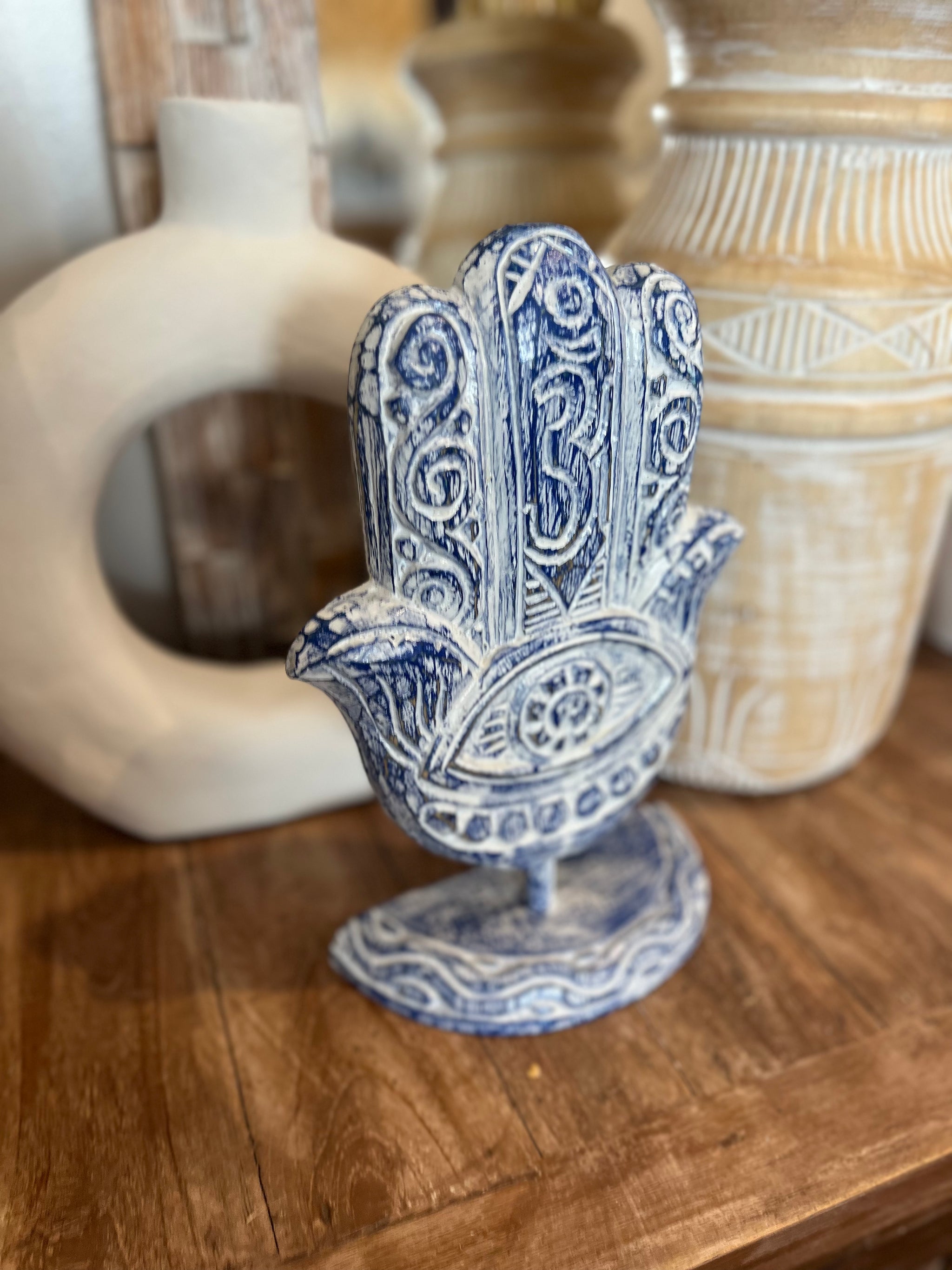 Hamsa handcarved hand. Blue. On stand. 30cm h