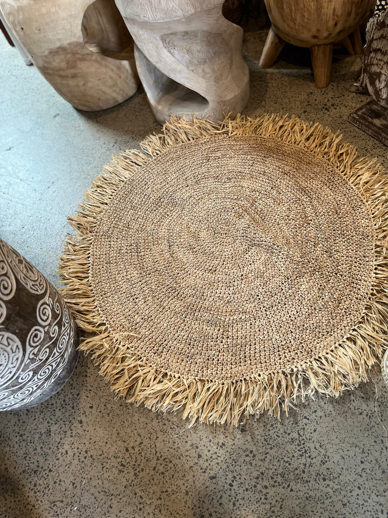 Round woven rug with raffia trim - Bali Beach Beyond