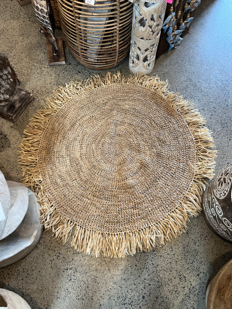 Round woven rug with raffia trim - Bali Beach Beyond