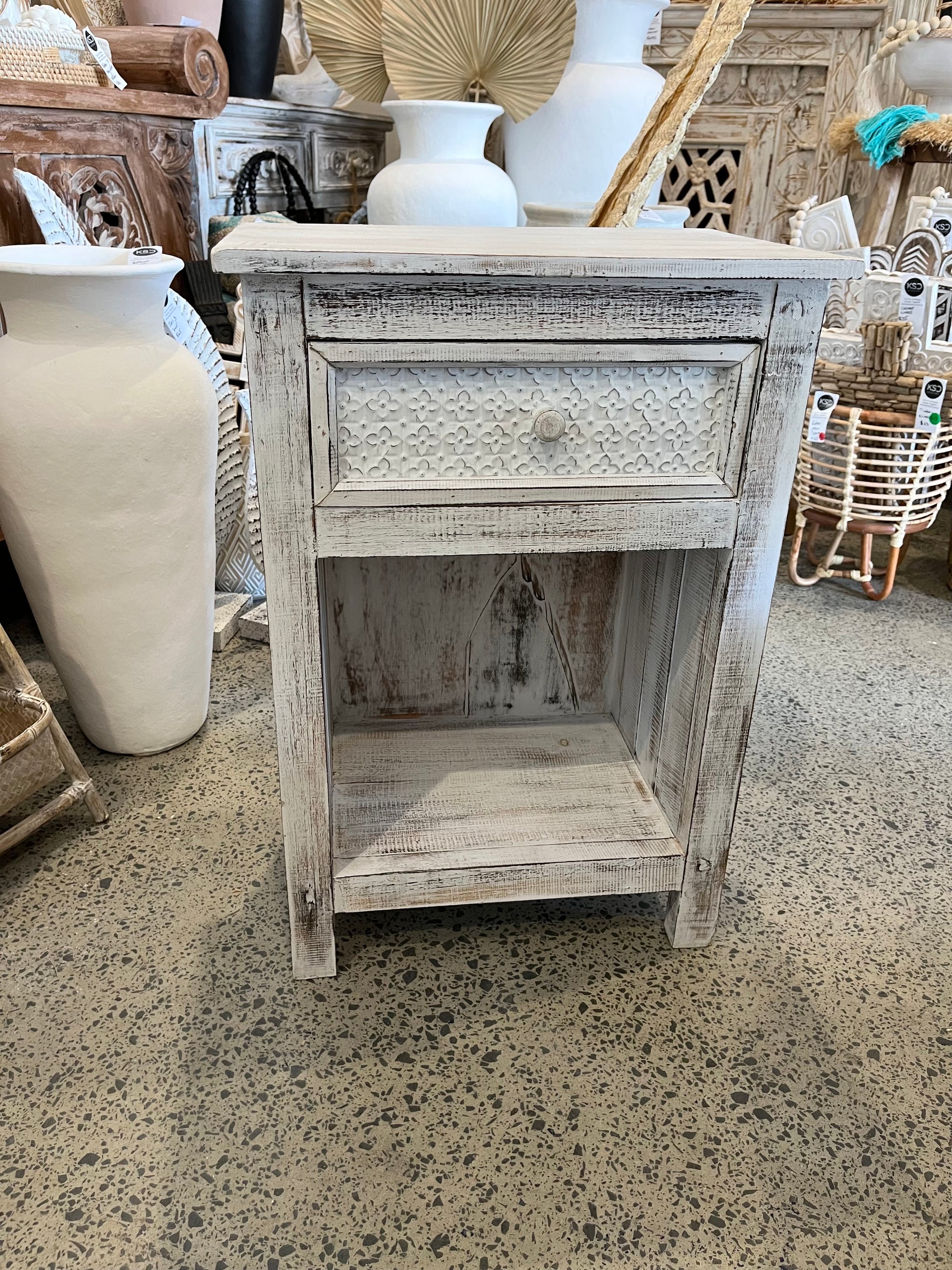 Rustic white timber bedside with pressed metal detailed drawer