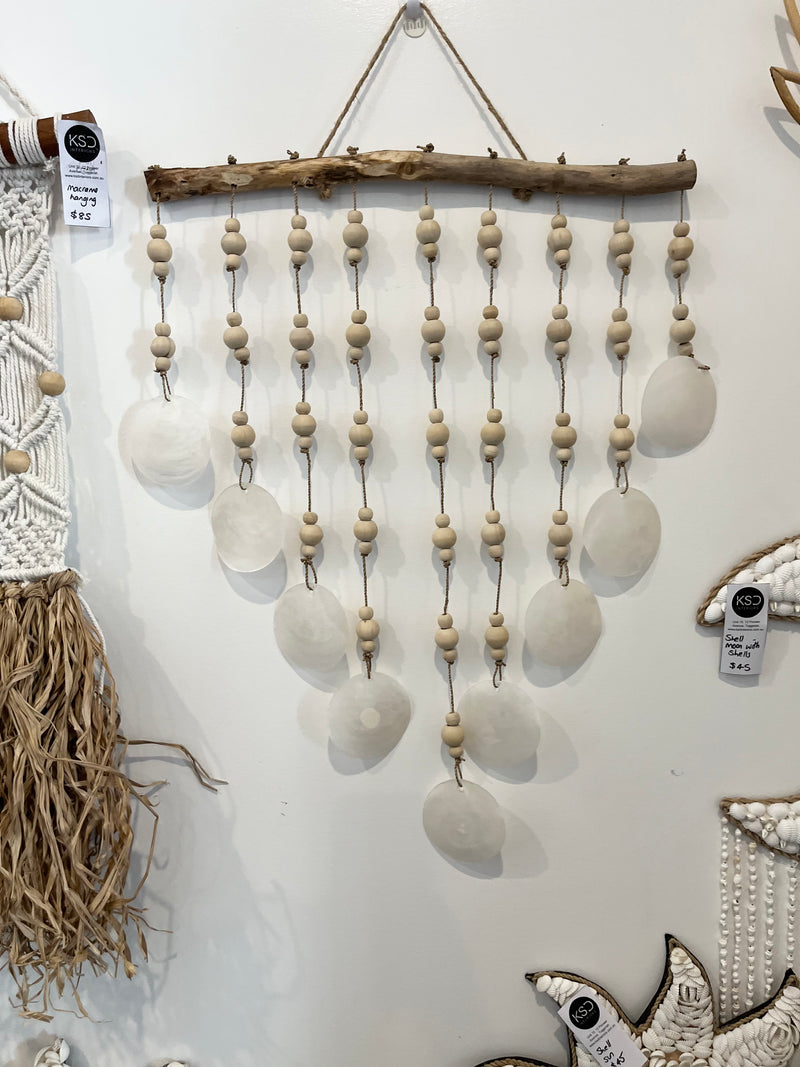 Clear shell and natural bead wall hanging