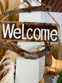 Welcome timber hanging sign.