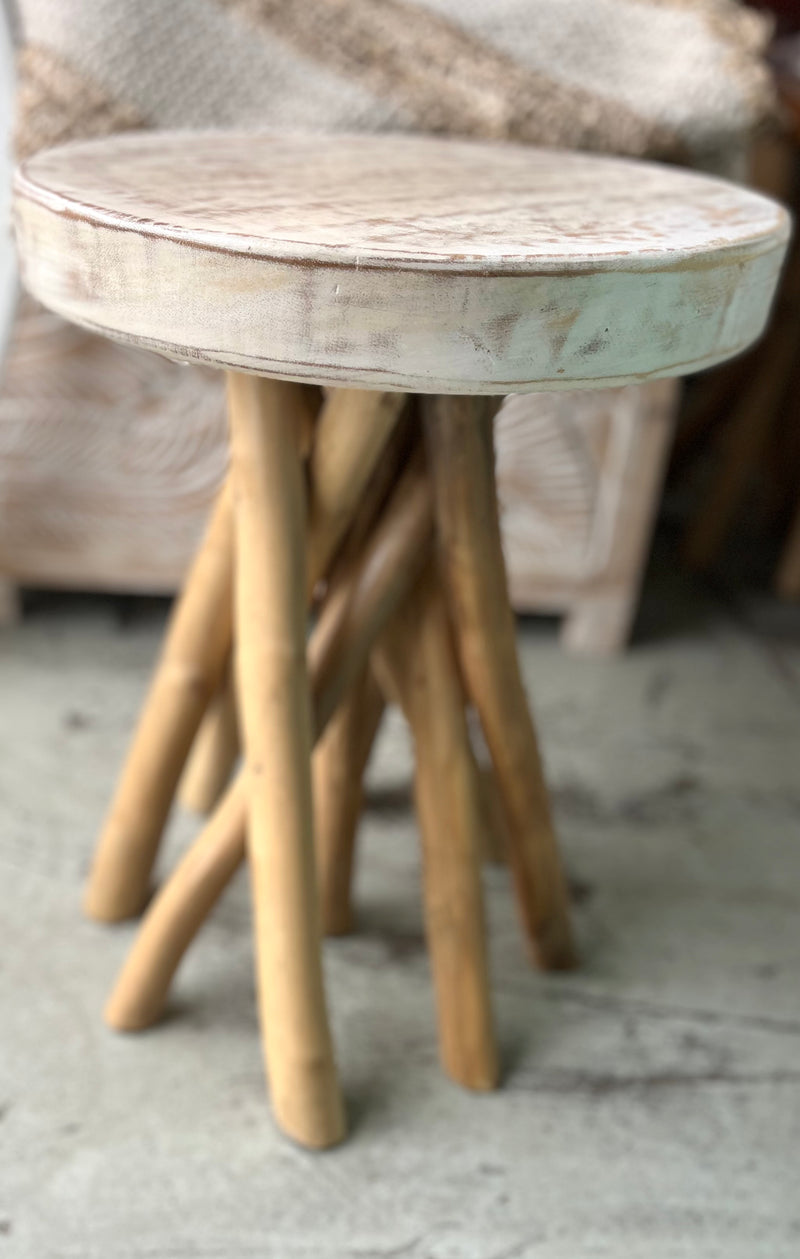 Timber round stool / side table. White wash top and natural angled legs