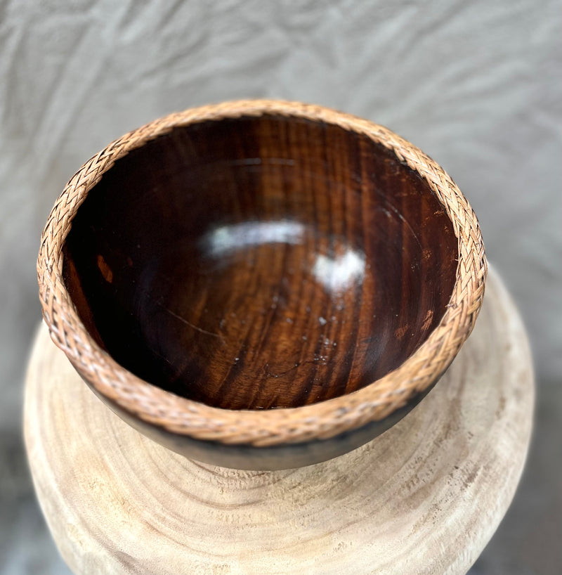 Brown timber bowl with rattan edge detail. M