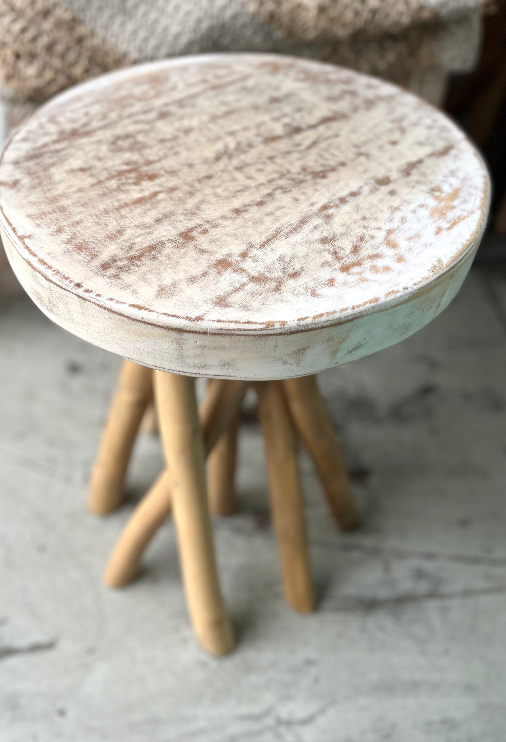 Timber round stool / side table. White wash top and natural angled legs