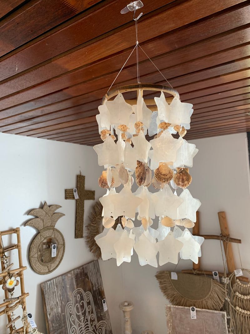 Clear and natural shell mobile hanging. Stars