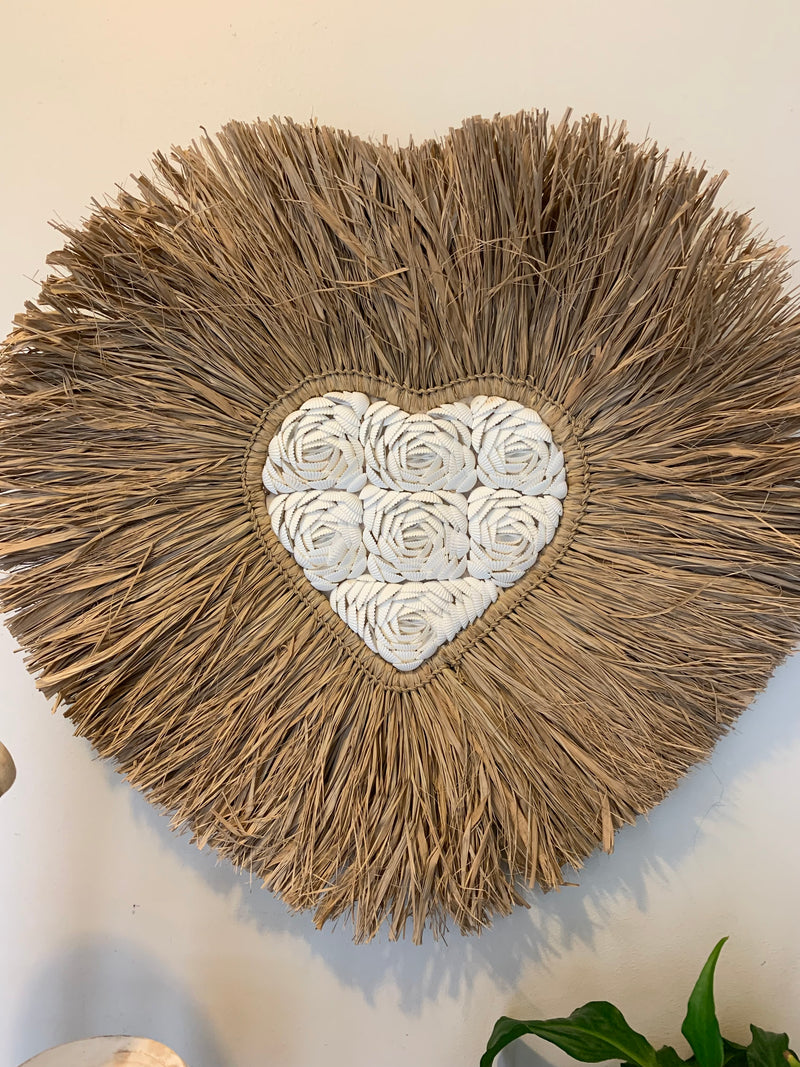 Raffia and shell wall hanging. Heart.