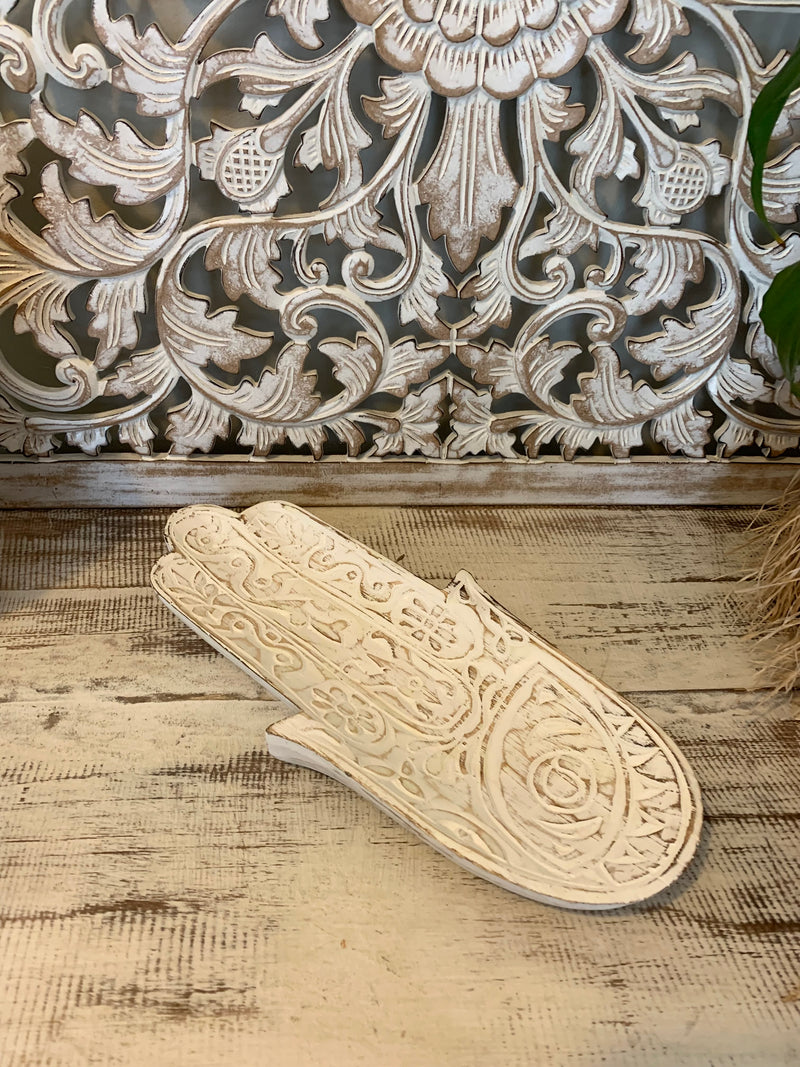 Carved timber hand