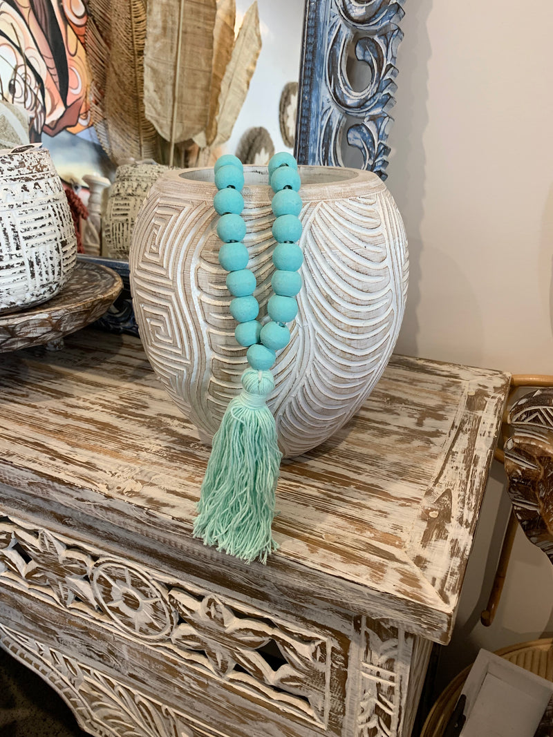 Light mint green bead necklace / tassel decoration. 60cm approx