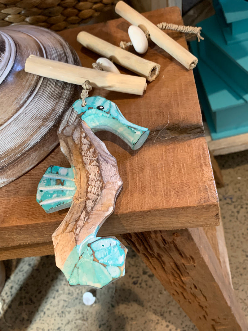 Handpainted timber seahorse hanging. Turquoise