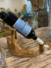 Natural timber duck wine holder.