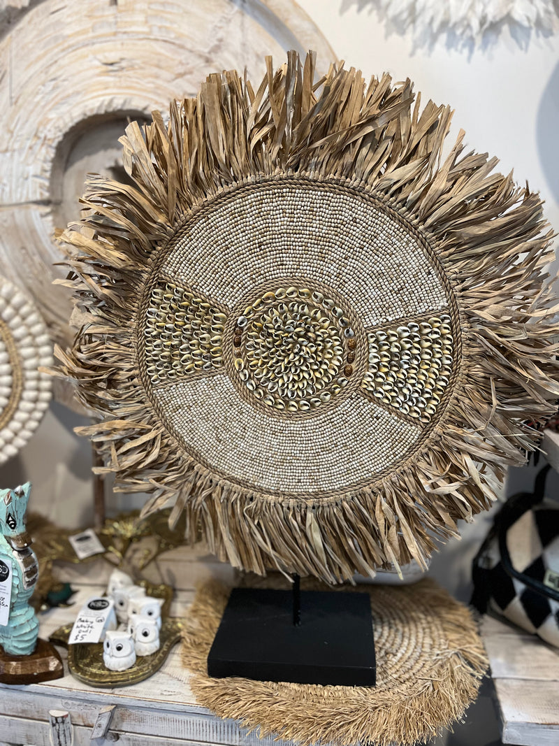 Raffia and shell decoration / juju on stand