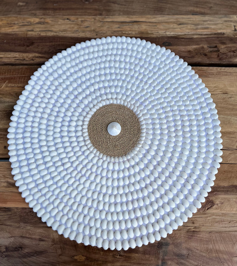 Round detailed shell wall hanging. 60cm