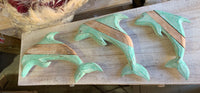 Set of 3 timber dolphin wall hangings