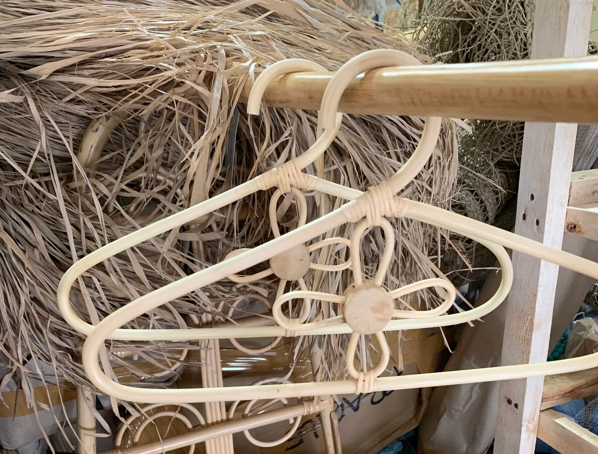 Rattan coat hanger. Usually $15