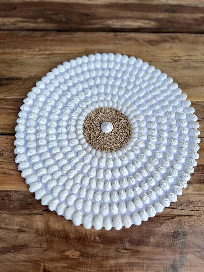 Round detailed shell wall hanging. 40cm