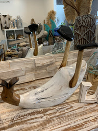 White timber duck wine holder.