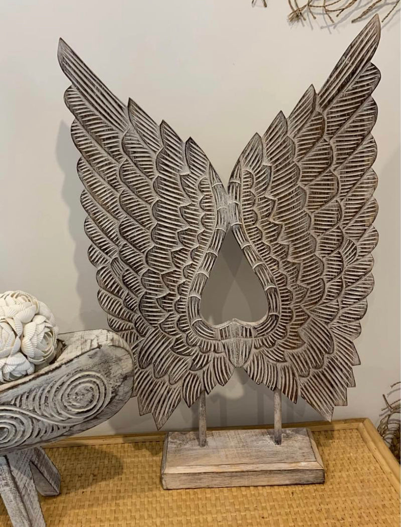 Carved timber angel wings natural. 60cm h