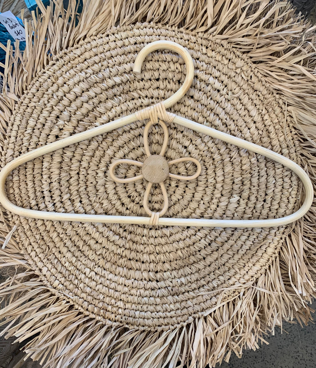 Rattan coat hanger. Usually $15