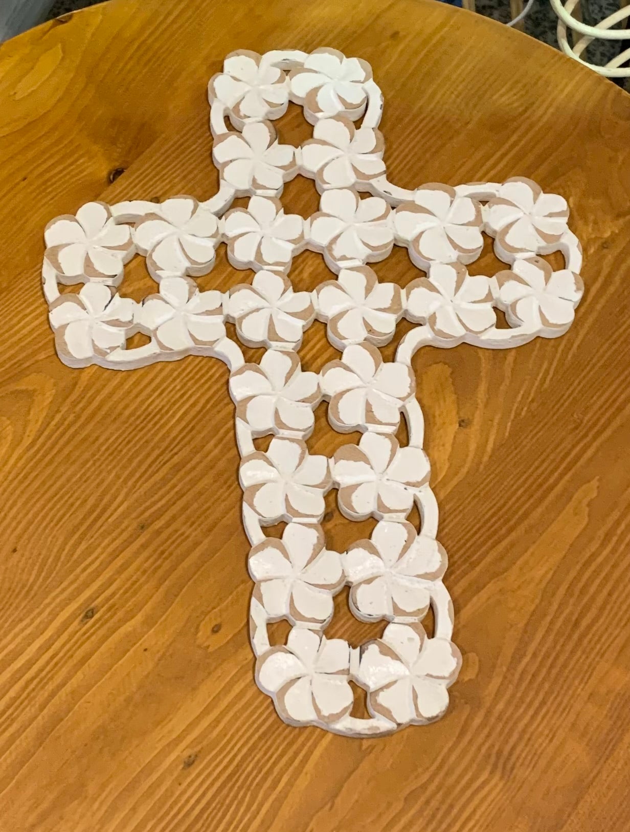 Carved frangipani cross. 41.5 h x 30cm w