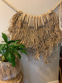 Raffia and rustic natural timber hanging