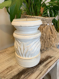 Large white rustic candle holder.