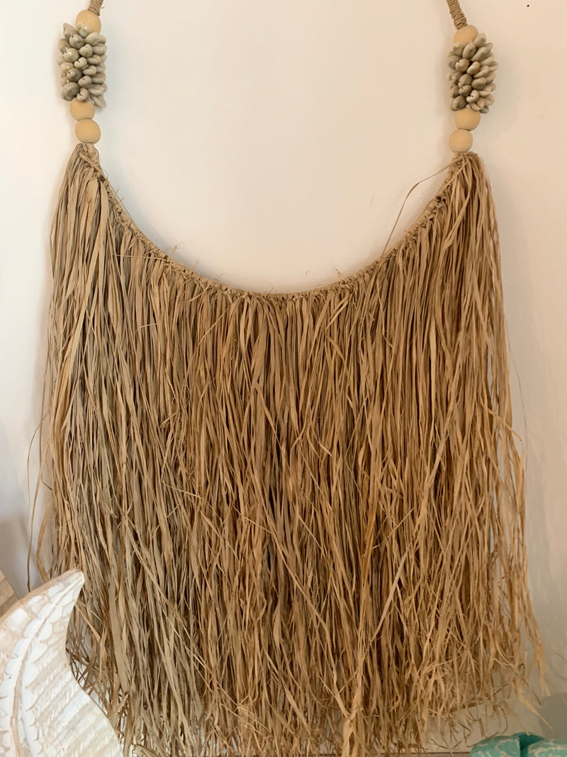 Raffia and shell wall hanging. 40cm