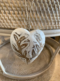 Carved timber heart hanging.