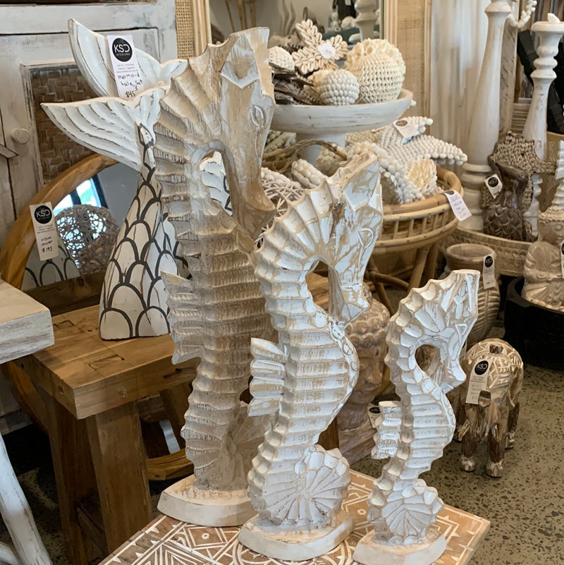 Handcrafted set of 3 timber seahorse. White wash