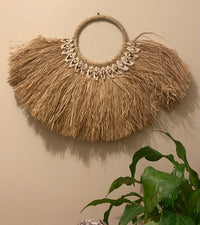 Wall hanging with natural shells