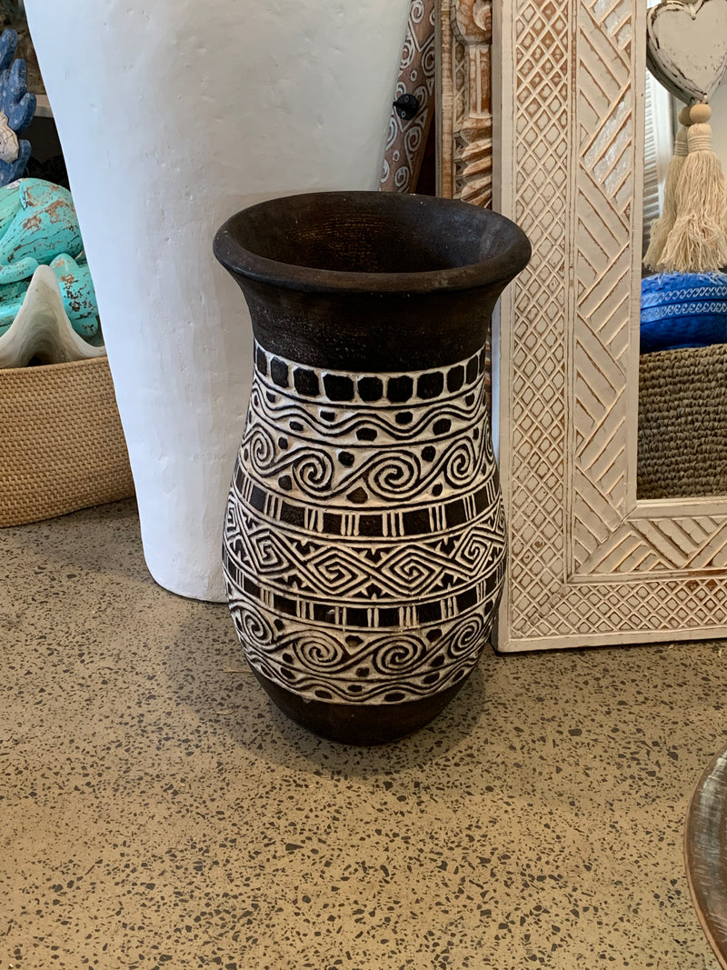 Black handcarved palm vase.